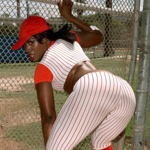 Black chick Kali Desires letting massive ass free from baseball uniform outdoors