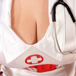 Brunette nurse Elaina Gregory flashing her huge ass and natural vagina in a uniform